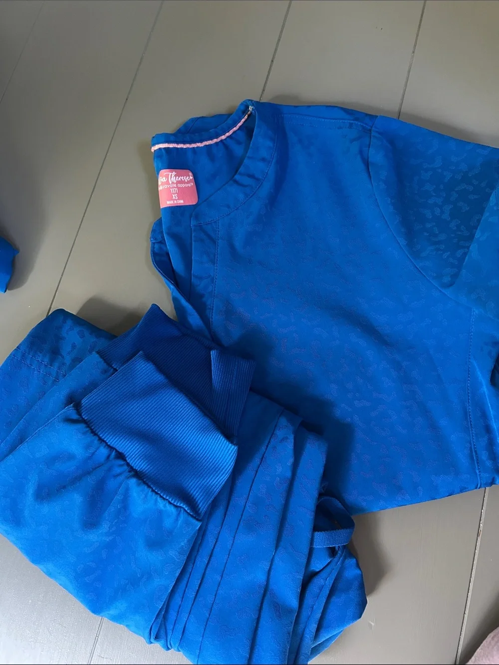 Bundle of royal blue nursing scrubs